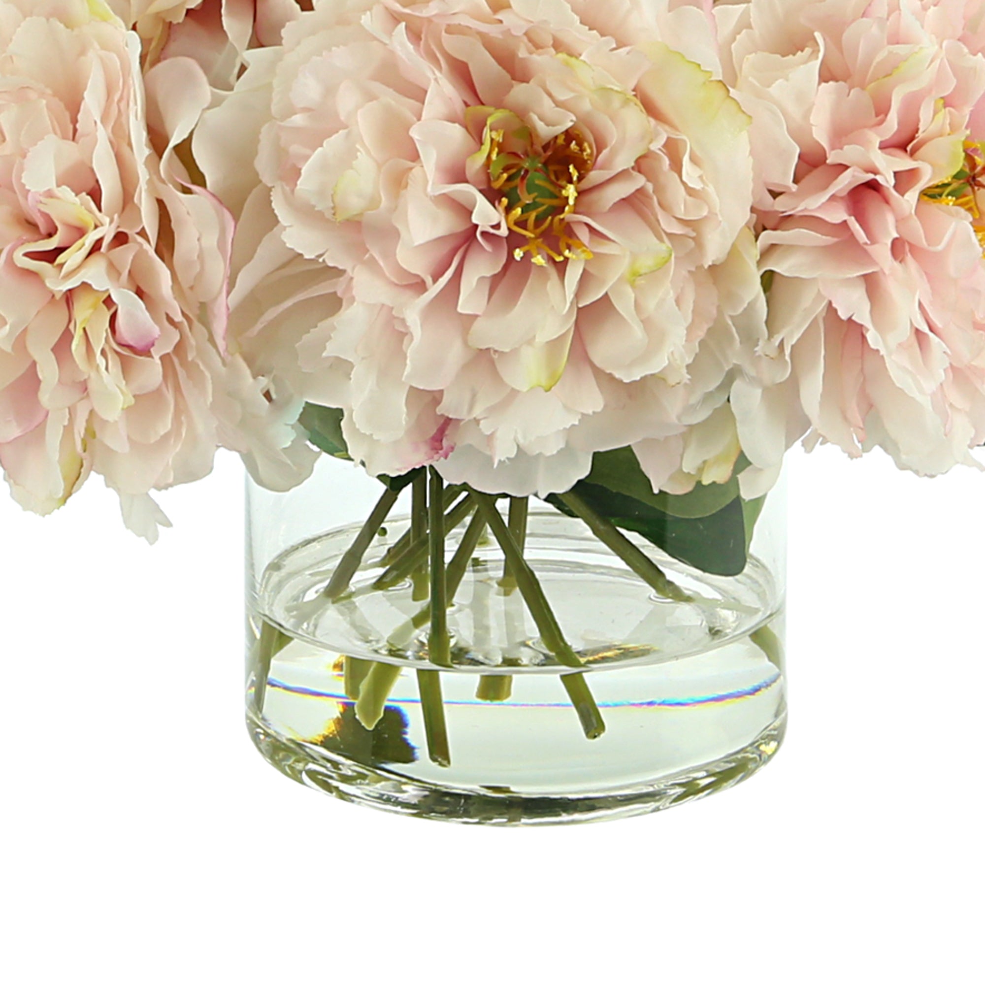 Peonies in clear glass vase