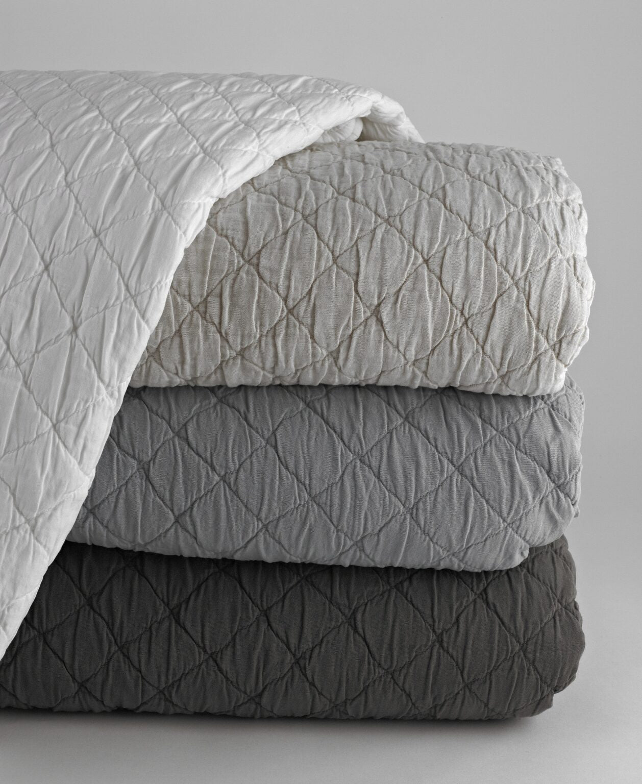 Soft, stonewashed Louisa coverlets and shams, made in Portugal and available in seven colors.